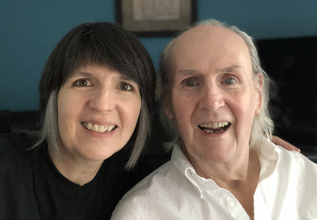 image of a female with dark hair on the left and an elderly man with white hair on the right