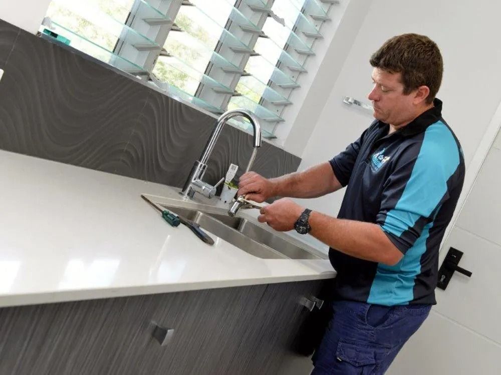Plumber Fixing Sink in Townsville
