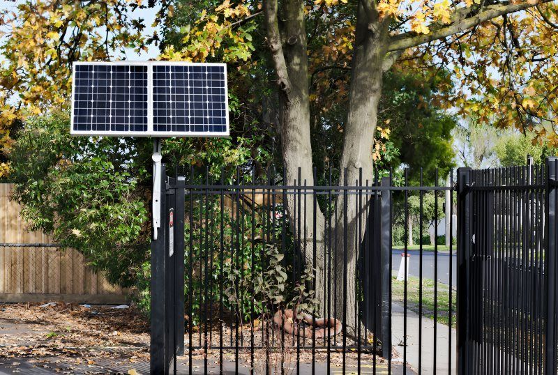 A Solar Panel Mounted on Gate — Barry Brown Rural Contracting Service in Tinonee, NSW