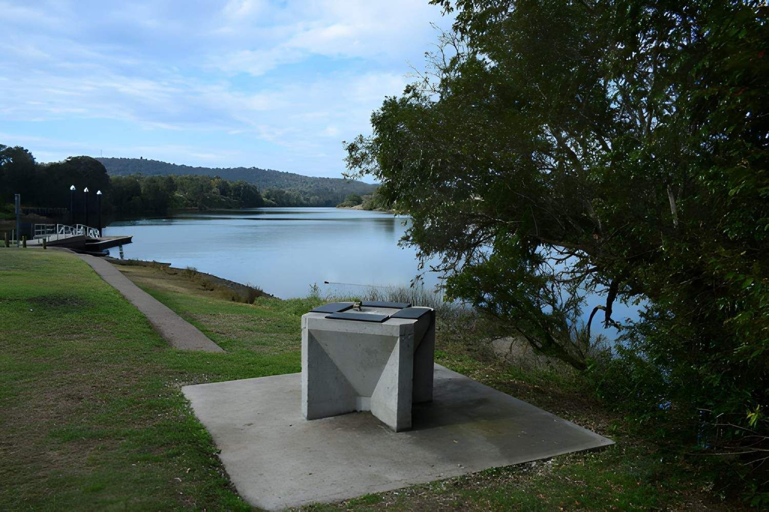 A Concrete Grill and Tree in Foreground — Barry Brown Rural Contracting Service in Wingham, NSW