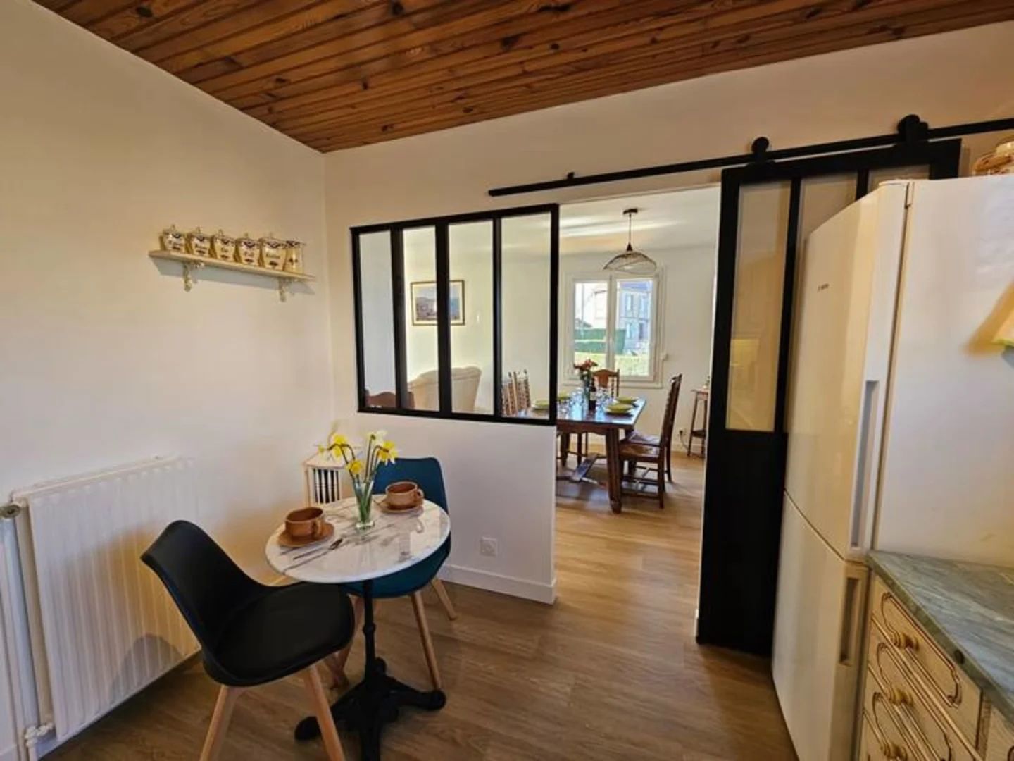 gite à beaurepaire près d'Etretat vue du salon véranda exterieur jardin