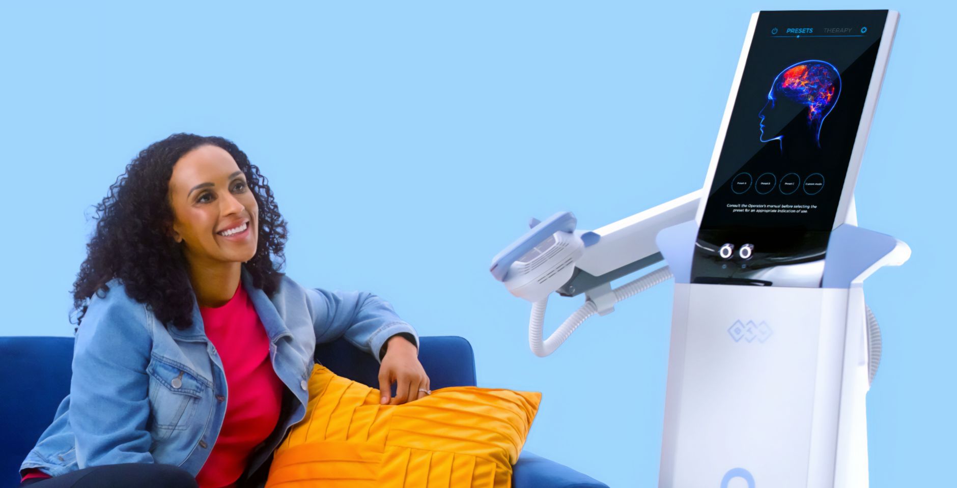 Woman on sofa smiles at a medical device with a screen displaying a brain scan. Light blue background.