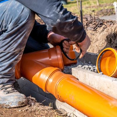 PVC plastic pipe for sewerage in the ground 
