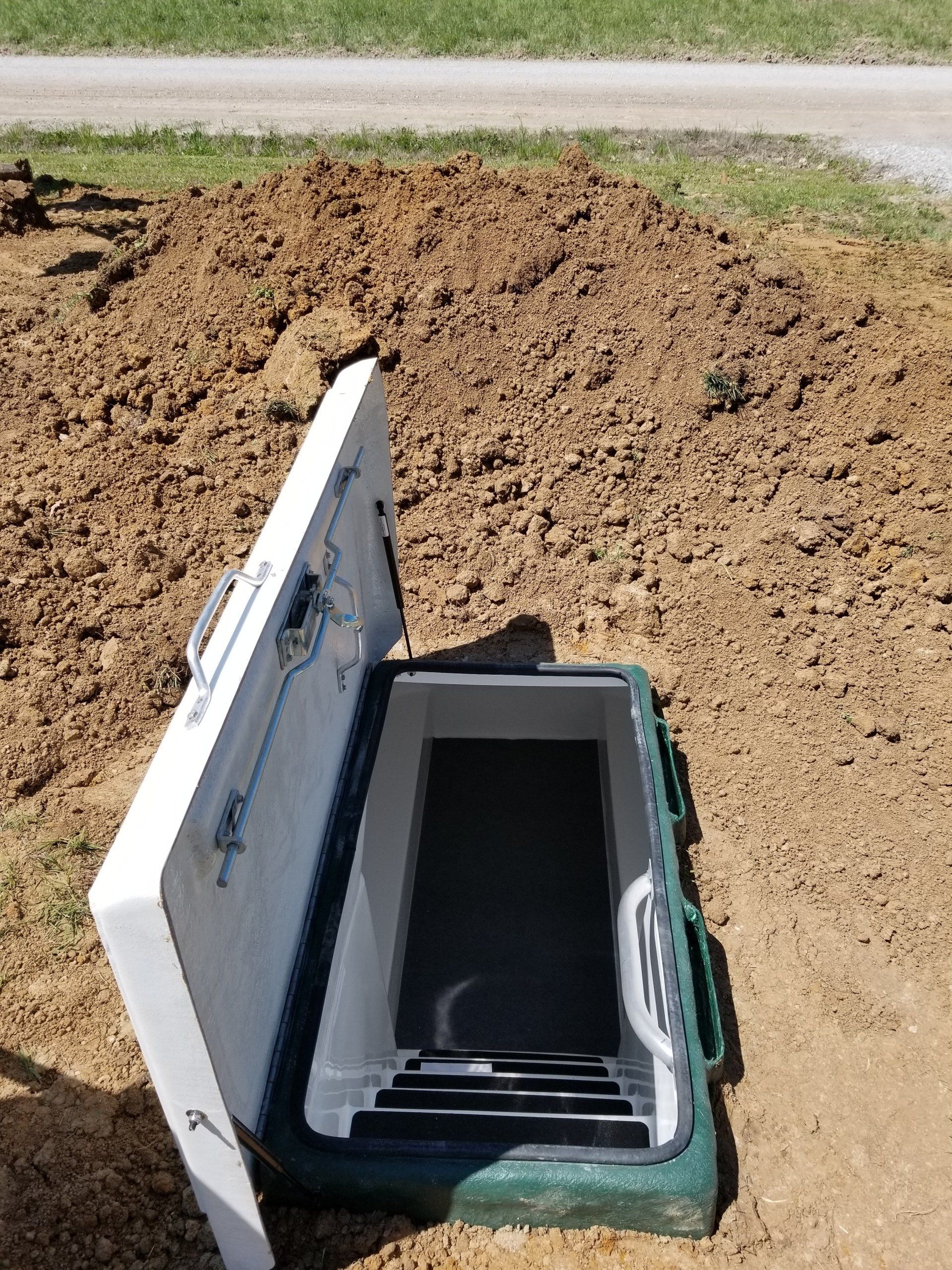 Underground Shelter Beside the Road | Oakland City, IN | Integrity Storm Shelters LLC