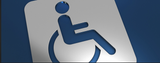 A silhouette of a person in a wheelchair on a blue background