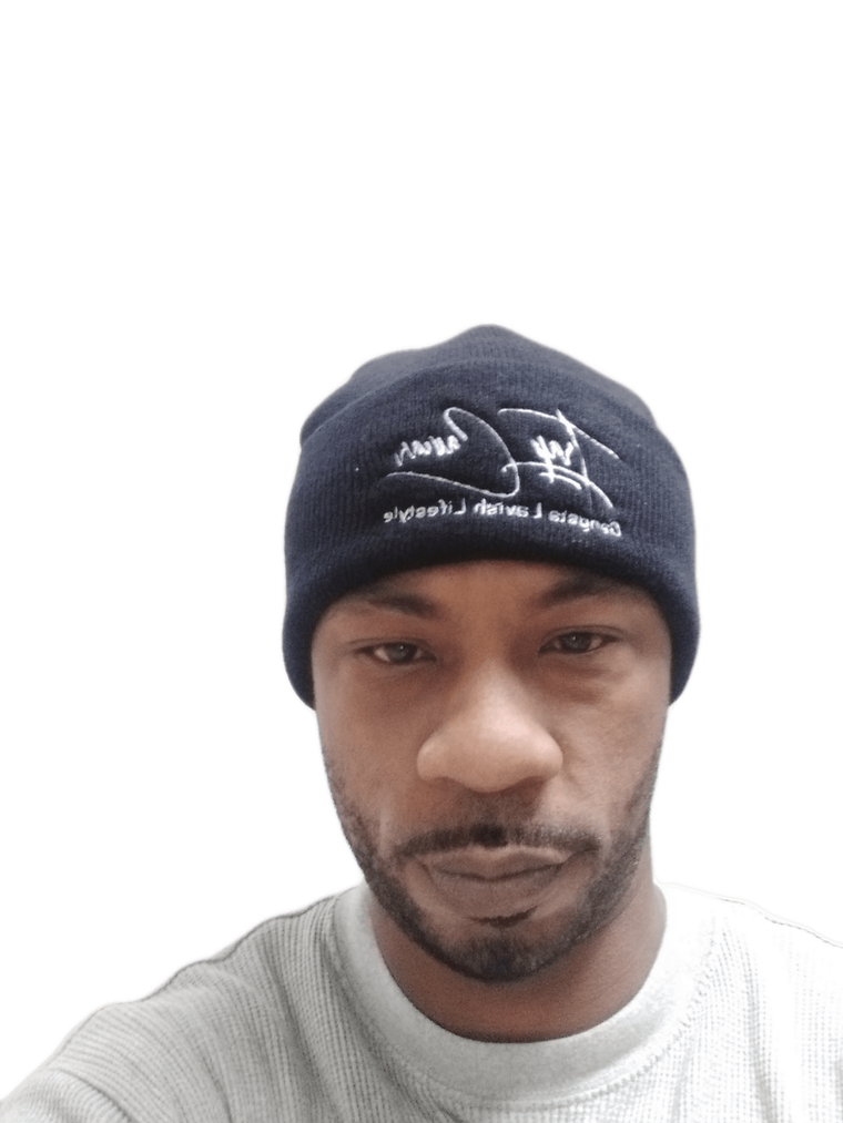 A man with a beard wearing a black beanie