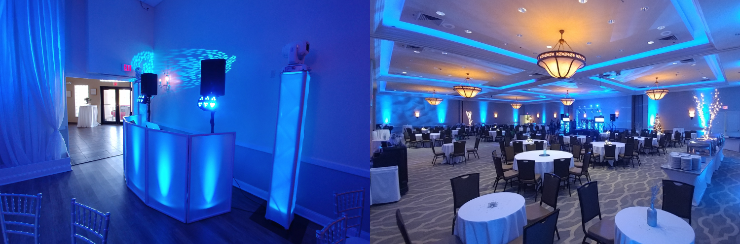 Blue-lit banquet hall with round tables, white chairs, and a glowing bar at the entrance