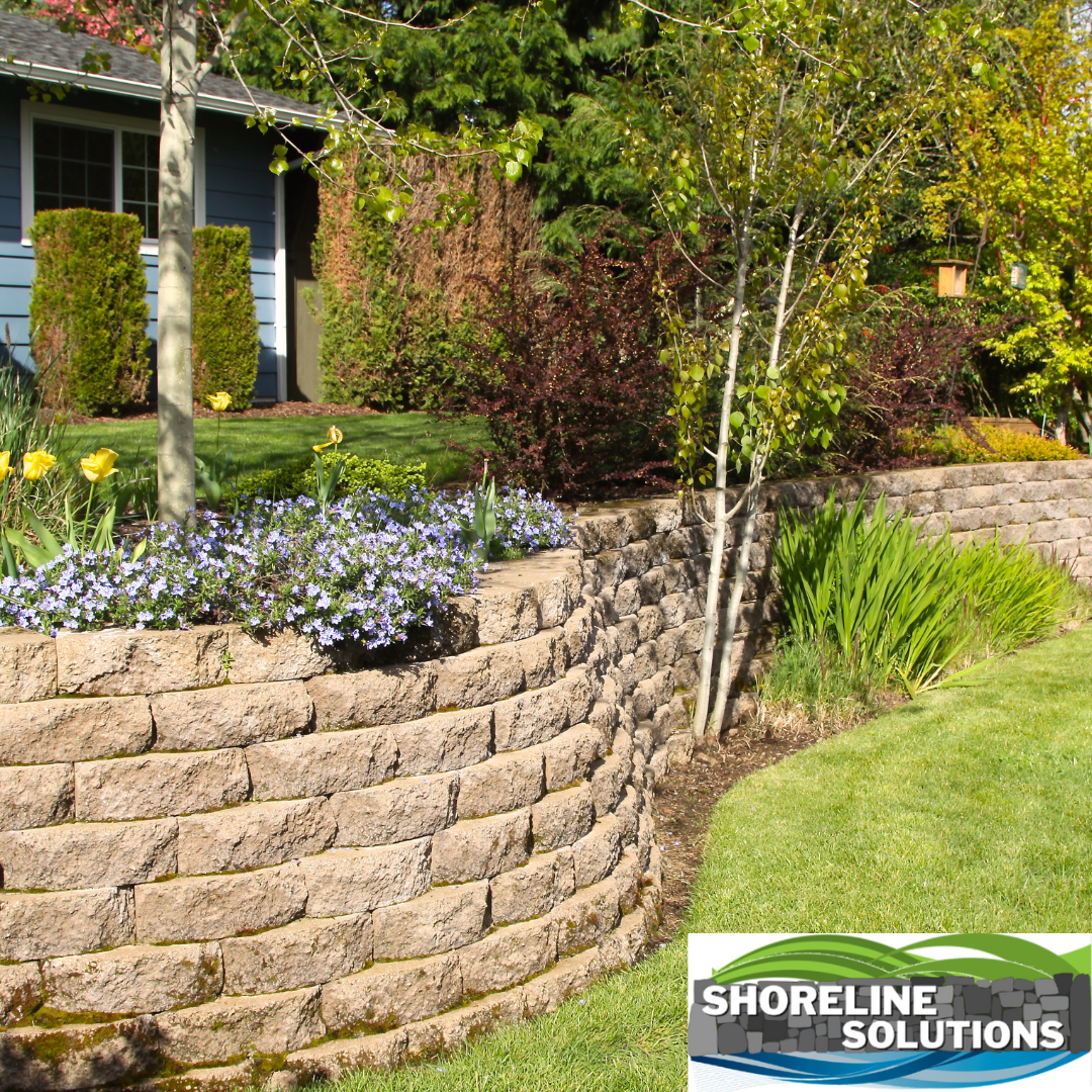 A picture of a garden with a shoreline solutions logo