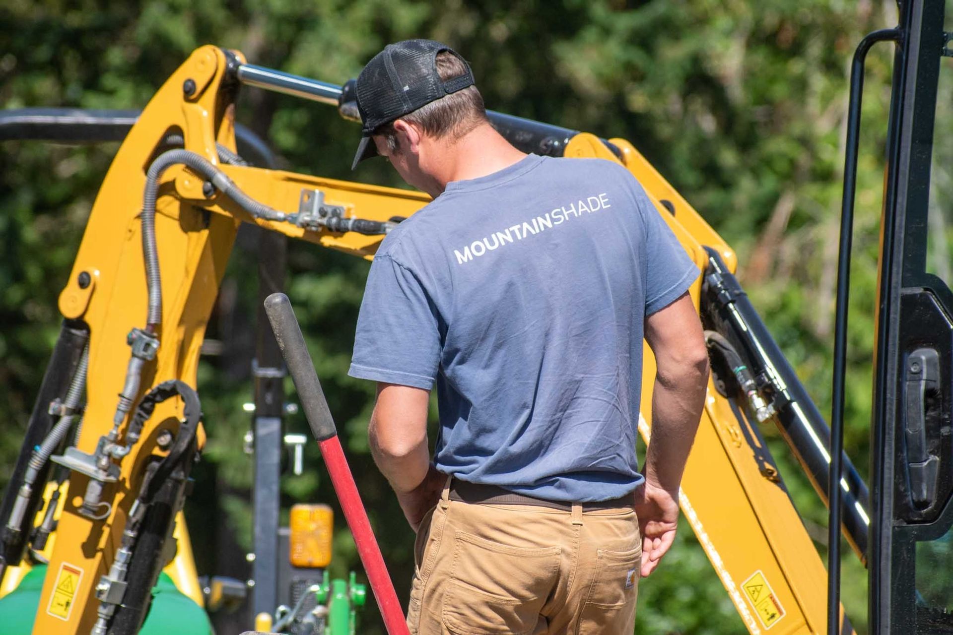 Man in blue shirt with 