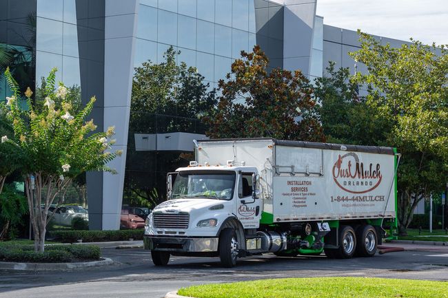 Mulch Truck In front of Office building - Just mulch Orlando