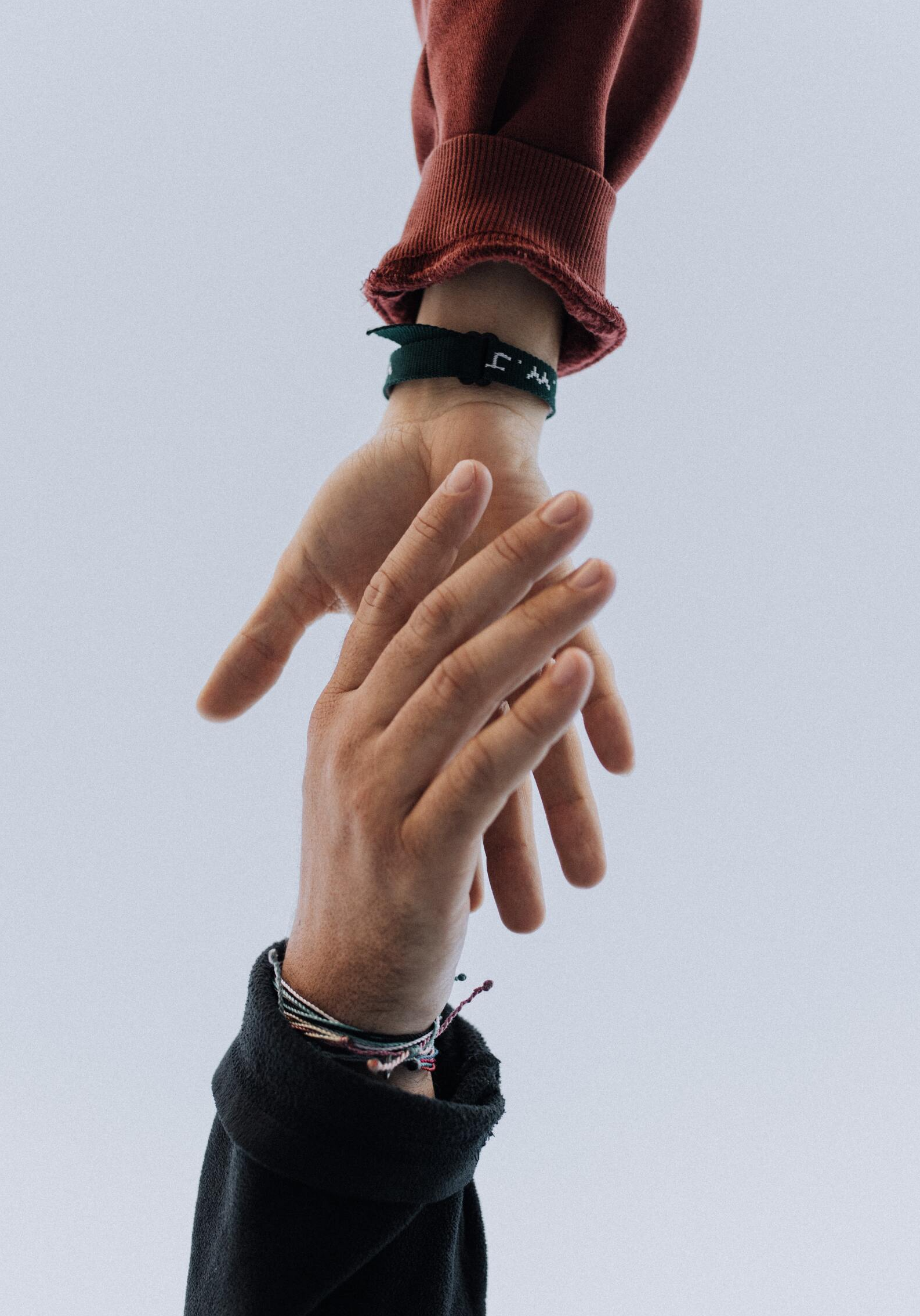 hands reaching out