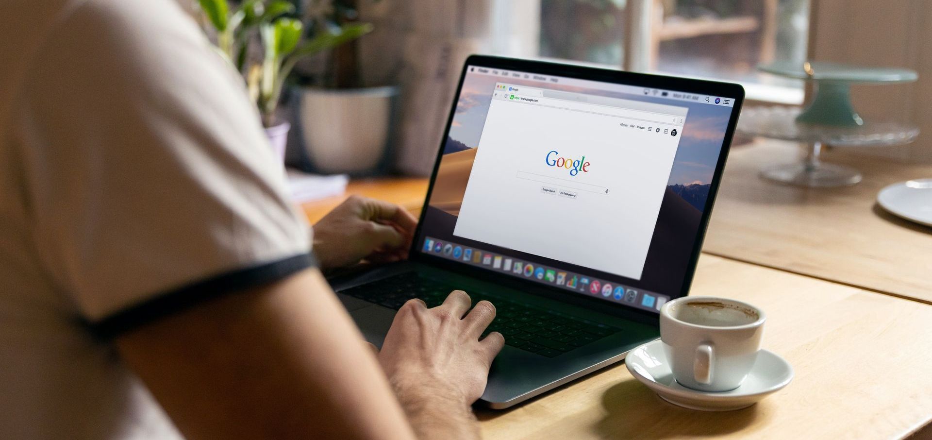 performing a google search on a laptop