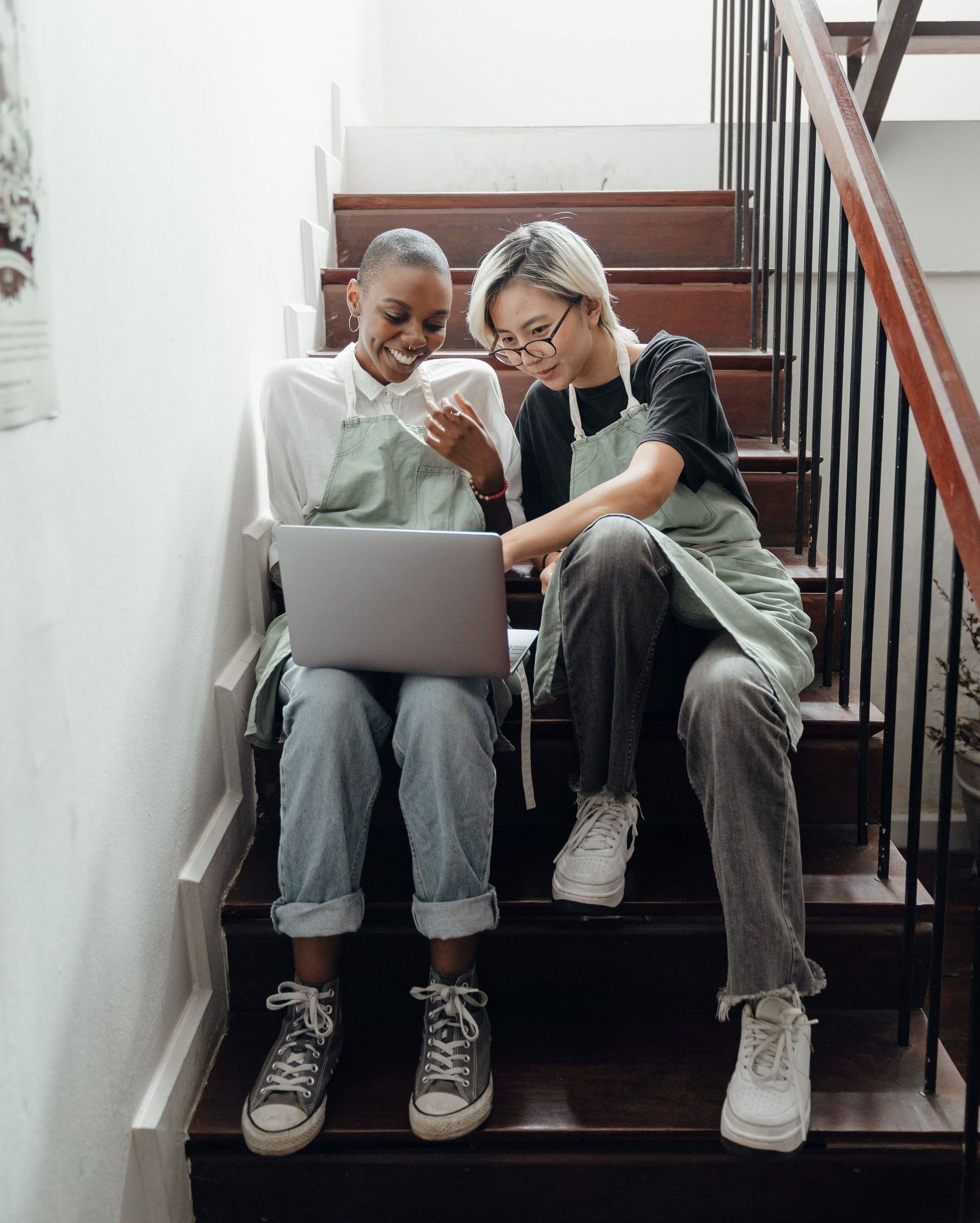 2 girls on a laptop