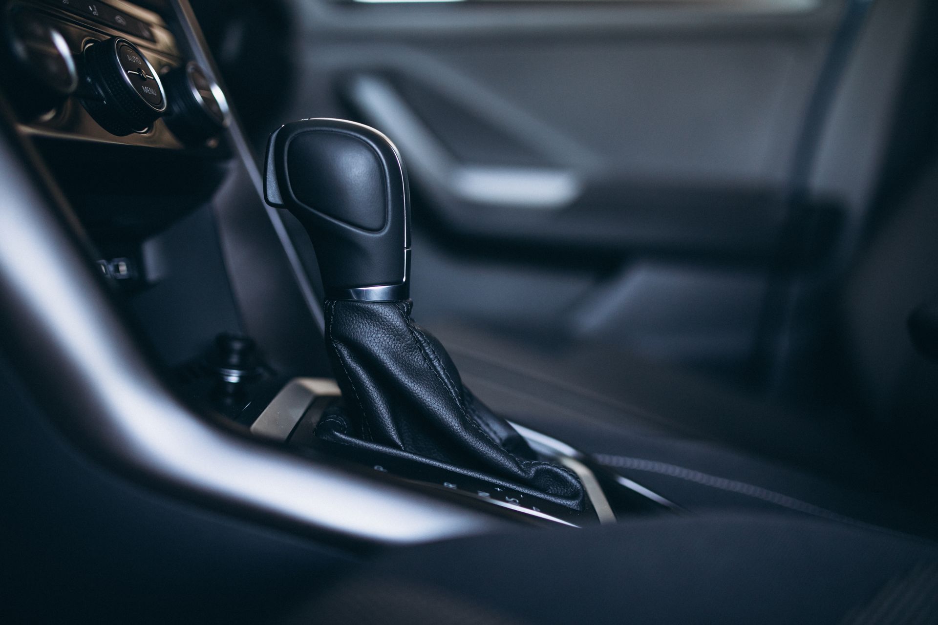 A close up of a gear stick in a car.