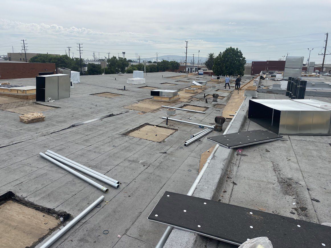 A roof with a lot of pieces of metal on it