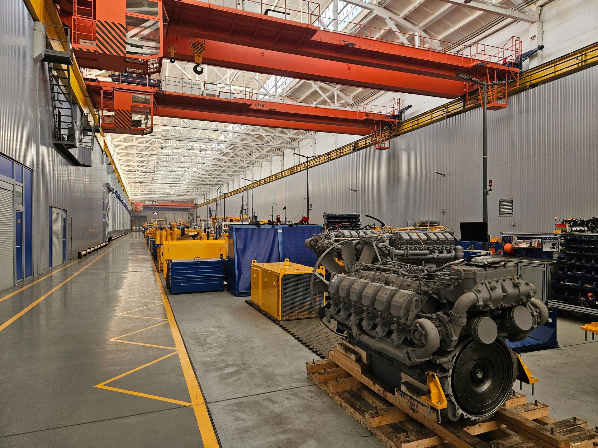 An overhead crane inside a factory building.