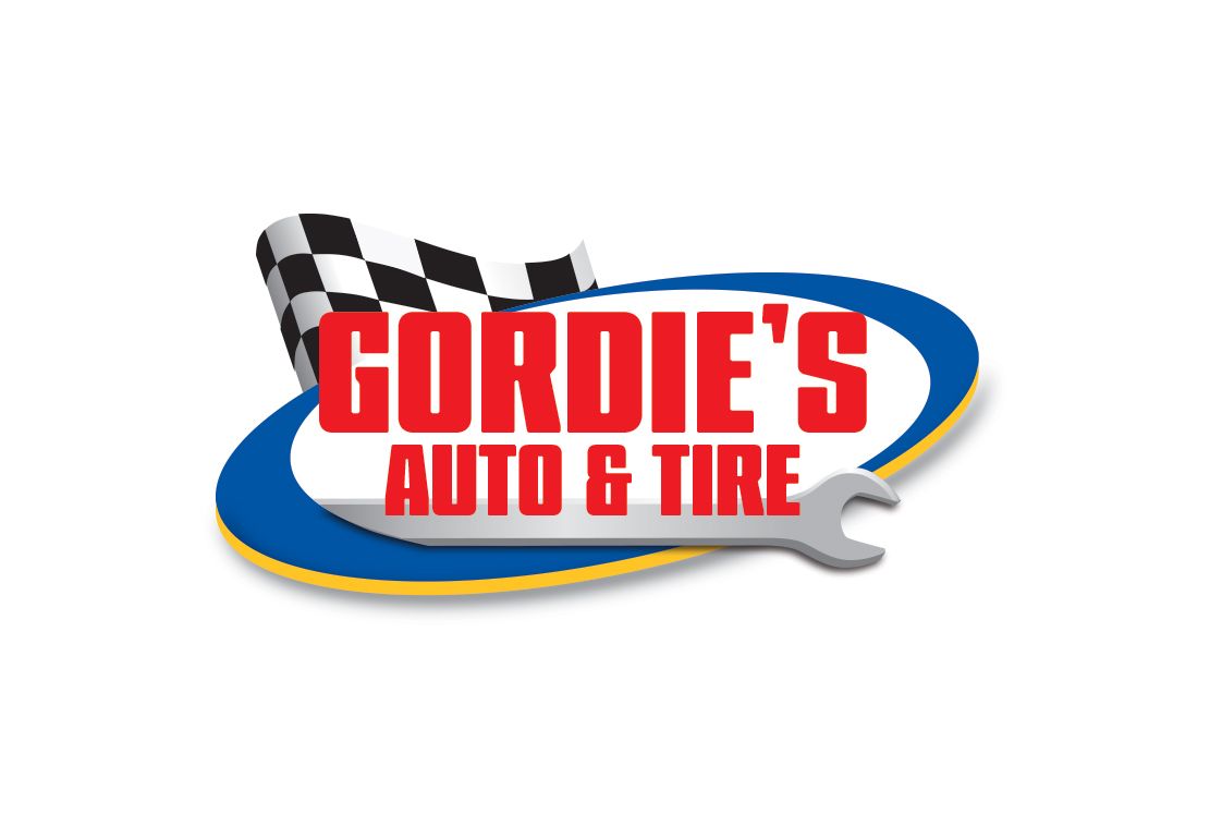 Gordie's Auto & Tire logo with a checkered flag, wrench, and text on a blue and yellow oval.