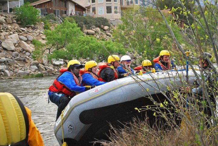 A group of people are rafting down a river.