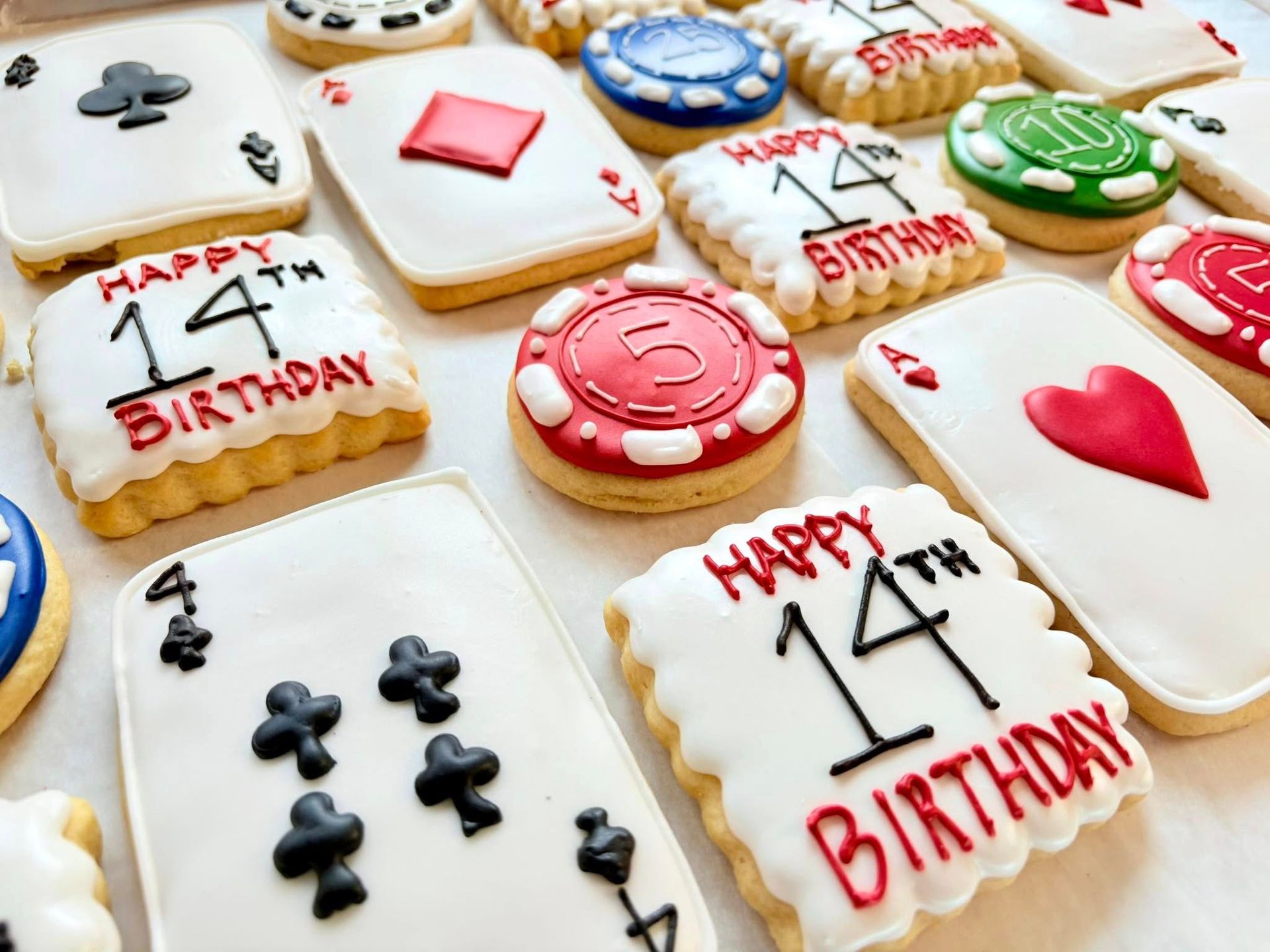Cookies decorated as playing cards and poker chips. Base Camp Bakery Gunnison, Colorado https://share.google/AgqUzUKNzsb0ThlP5, https://www.facebook.com/BaseCampBakery1, https://www.instagram.com/basecampbakery_81230