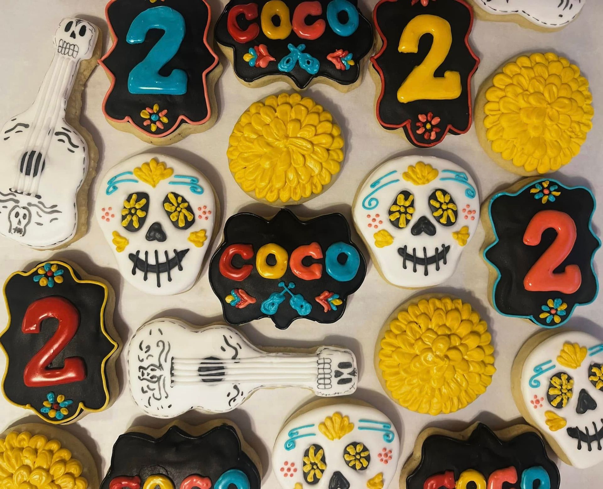 Cookies decorated with Coco-themed. Base Camp Bakery Gunnison, Colorado https://share.google/AgqUzUKNzsb0ThlP5, https://www.facebook.com/BaseCampBakery1, https://www.instagram.com/basecampbakery_81230
