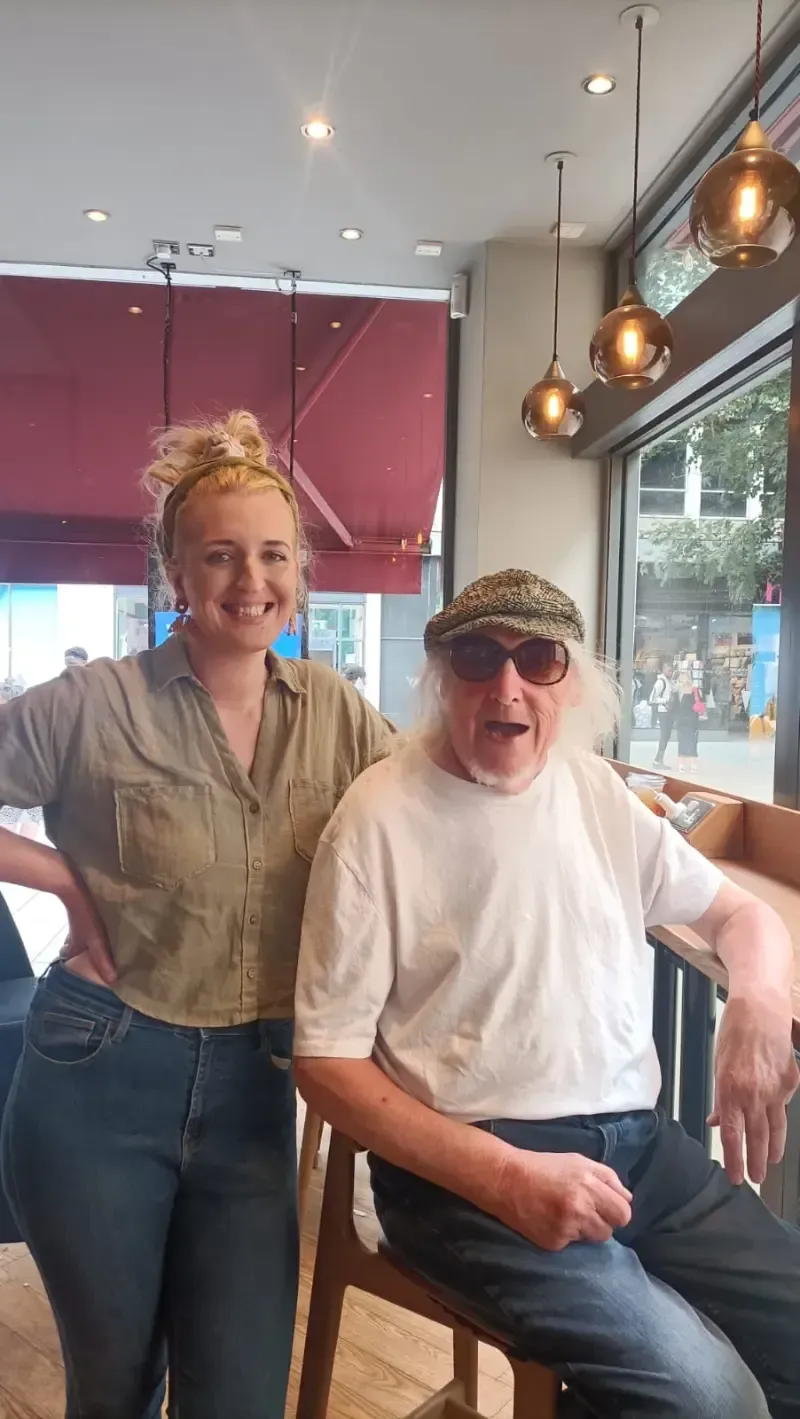The Anchor Society Bristol | A man and a woman are posing for a picture in a restaurant.