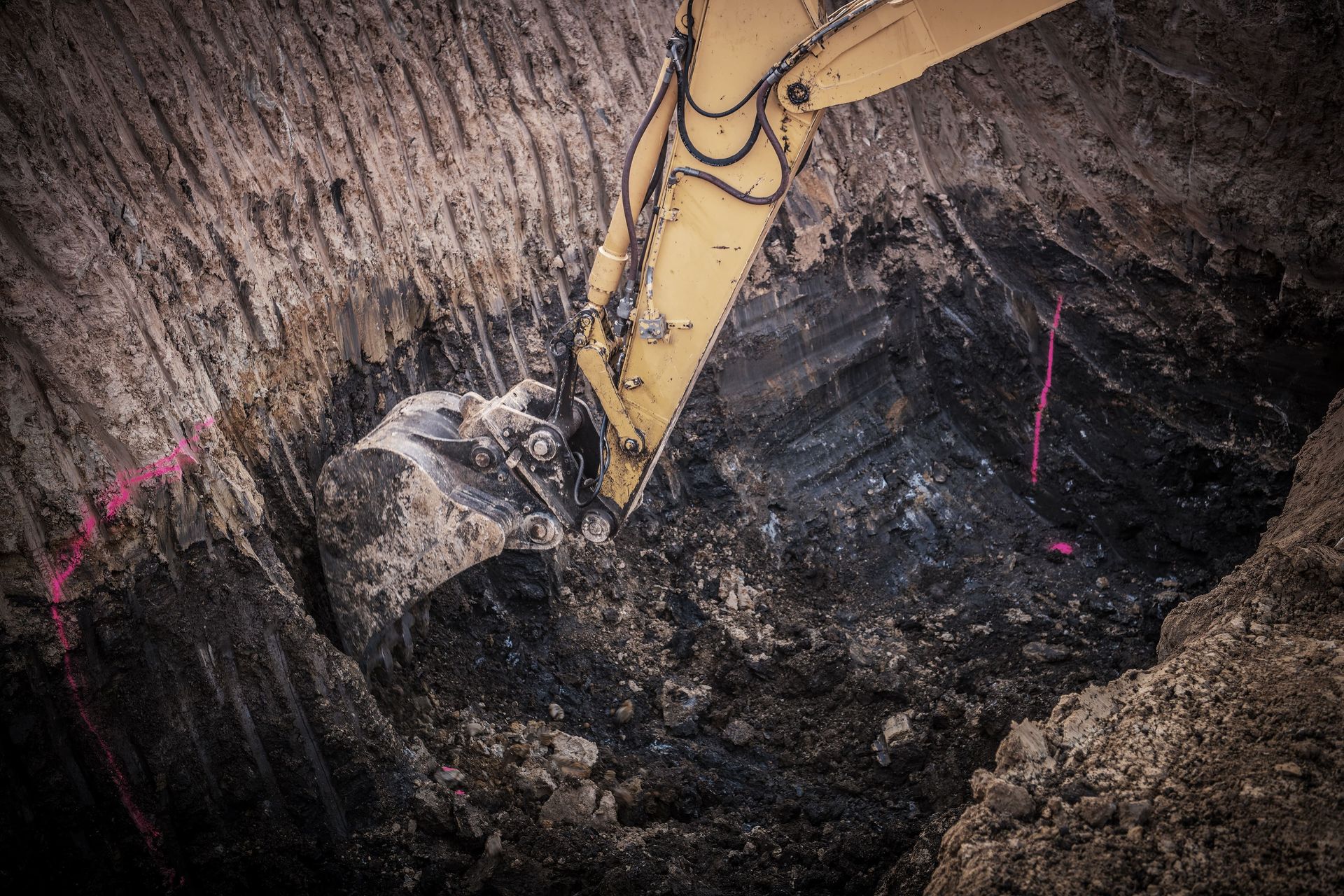 A Bulldozer is Digging a Hole in the Ground