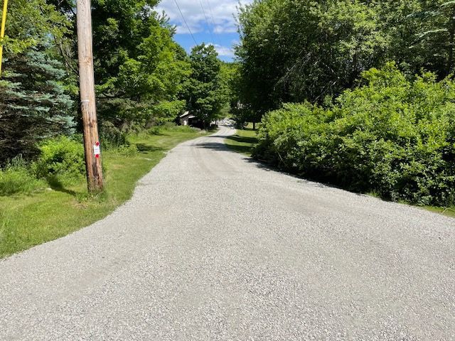 A Road With Trees on Both Sides of It