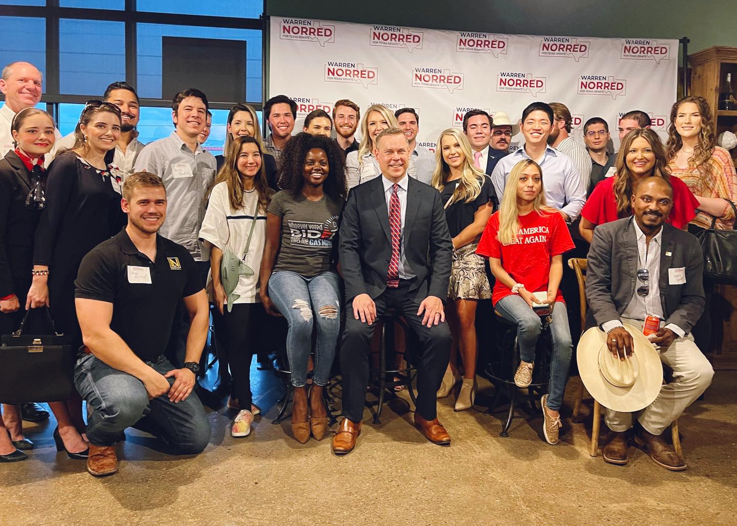 A large group of people are posing for a picture.