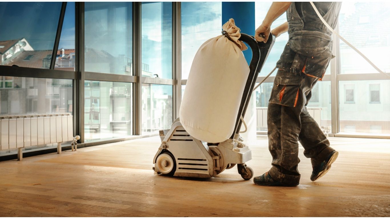 Sanding hardwood floors in Virginia Beach apartment