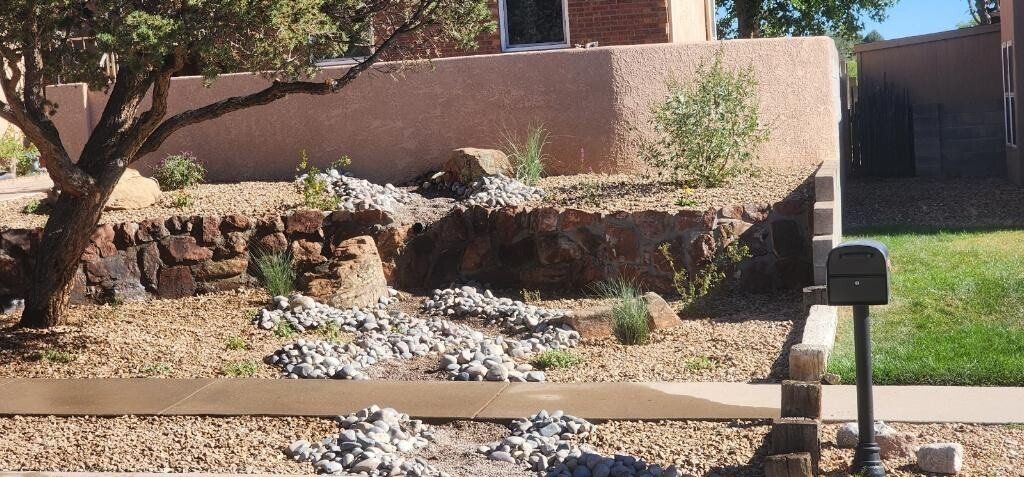 A house with a mailbox in front of it