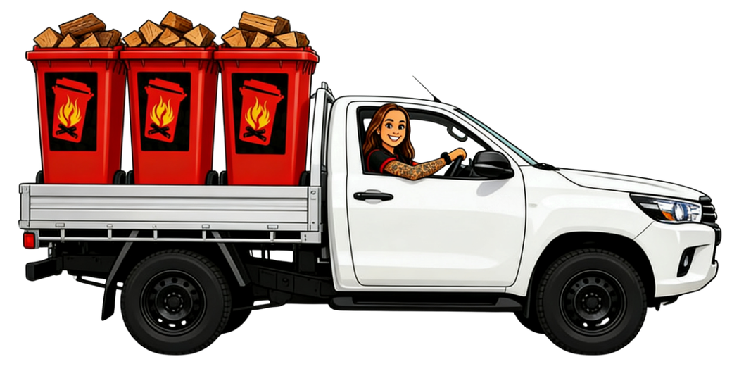 Ryans Wheelie Wood team member driving white truck hauling three red wheelie bins filled with rocks, driver at the wheel