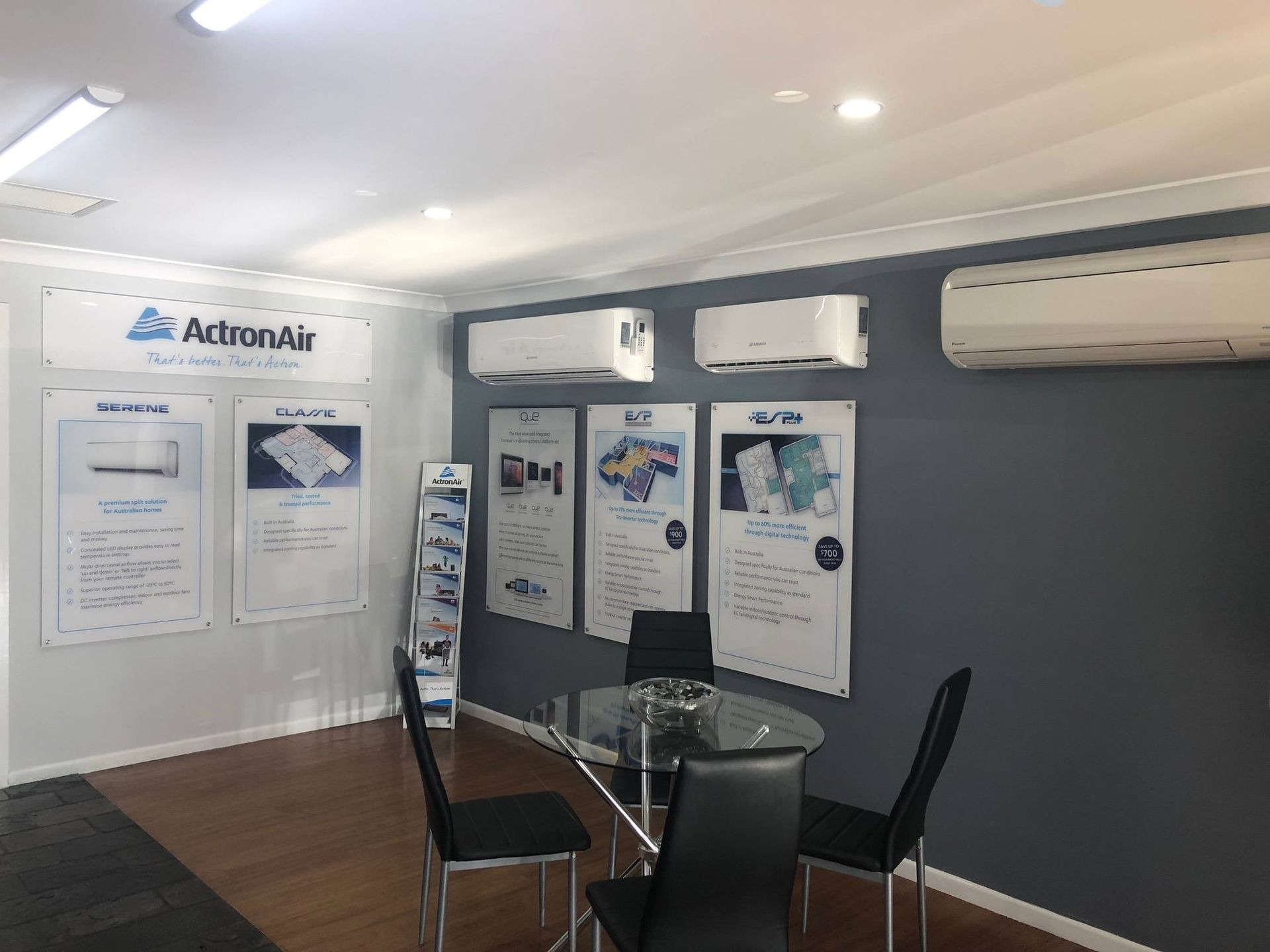 A Room with A Table and Chairs and Air Conditioners on The Walls — Northernair in Brunswick Heads, NSW