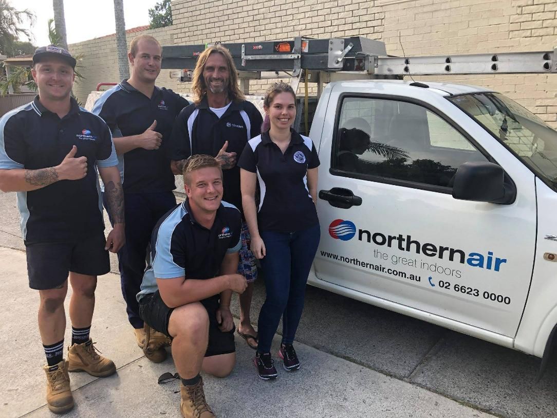 A Group of People Are Posing for A Picture in Front of A Northern Air Truck — Northernair in East Lismore, NSW