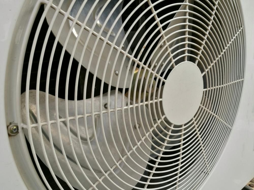 A Close up Of a White Fan with A Black Background — Northernair in Mullumbimby, NSW