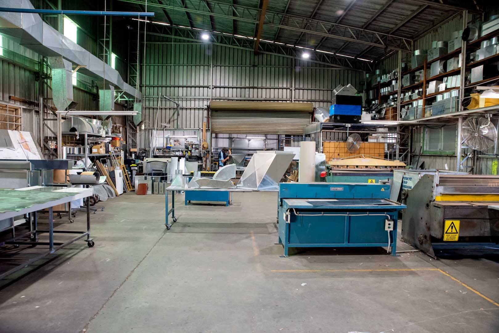 A Large Warehouse Filled With Lots of Machinery and Tables — Northernair in East Lismore, NSW