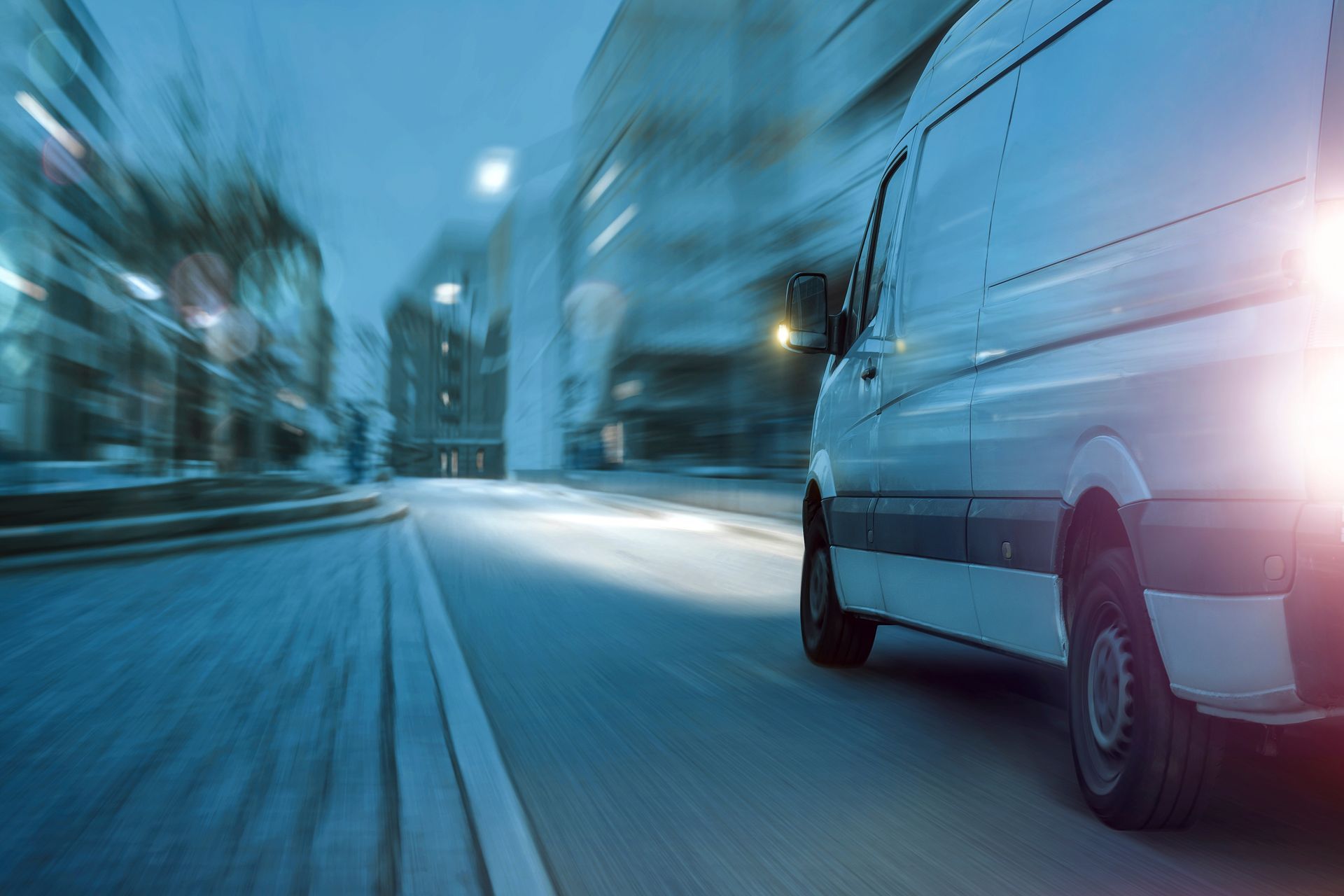 Fast moving delivery van at night