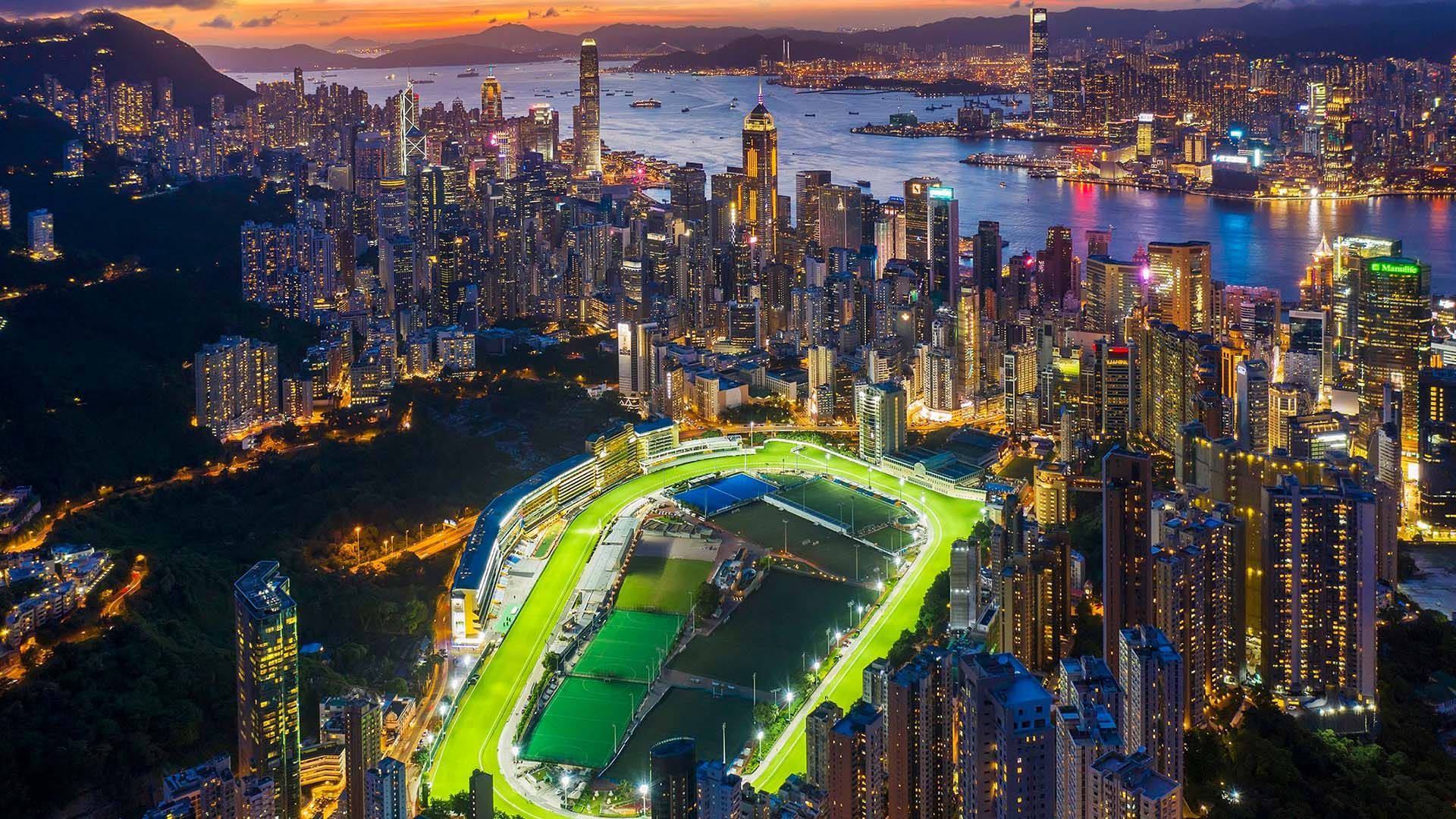 Happy Valley Racecourse Hong Kong skyline night racing international racing experience