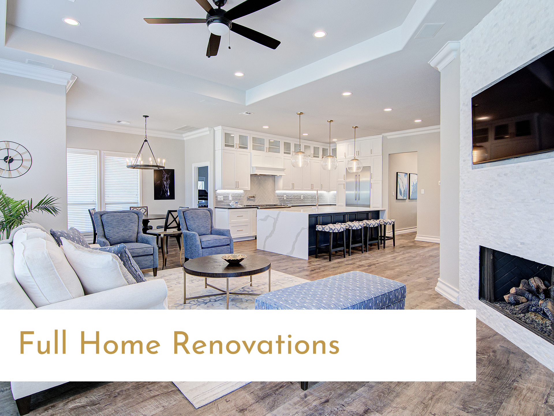 A living room filled with furniture and a ceiling fan.