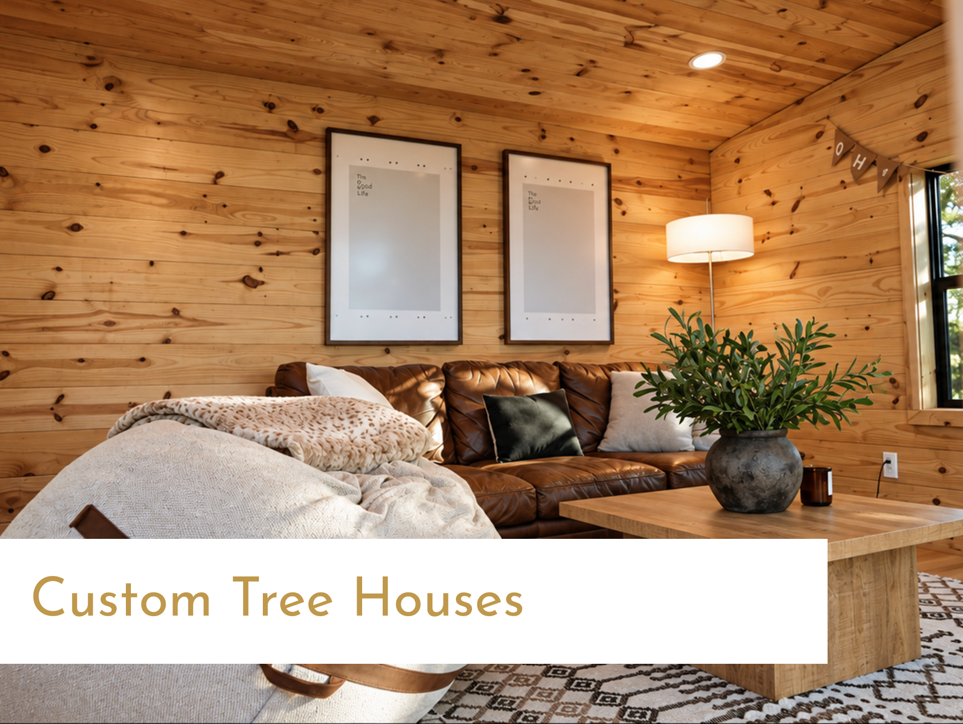 Cozy wood-paneled tree house interior with couch, table, wall art, and lamp for Custom Tree House.