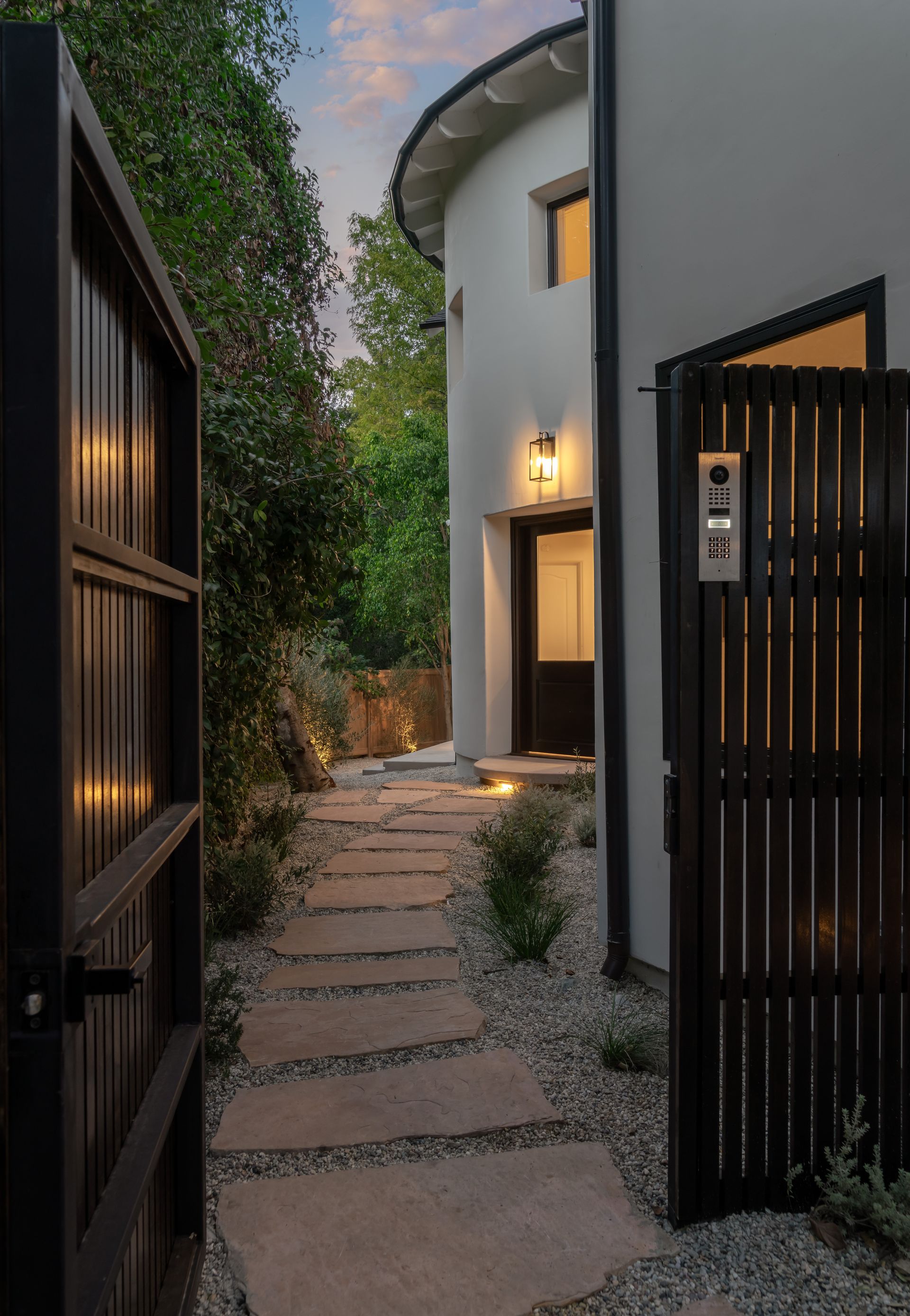 A walkway leading to the front door of a house