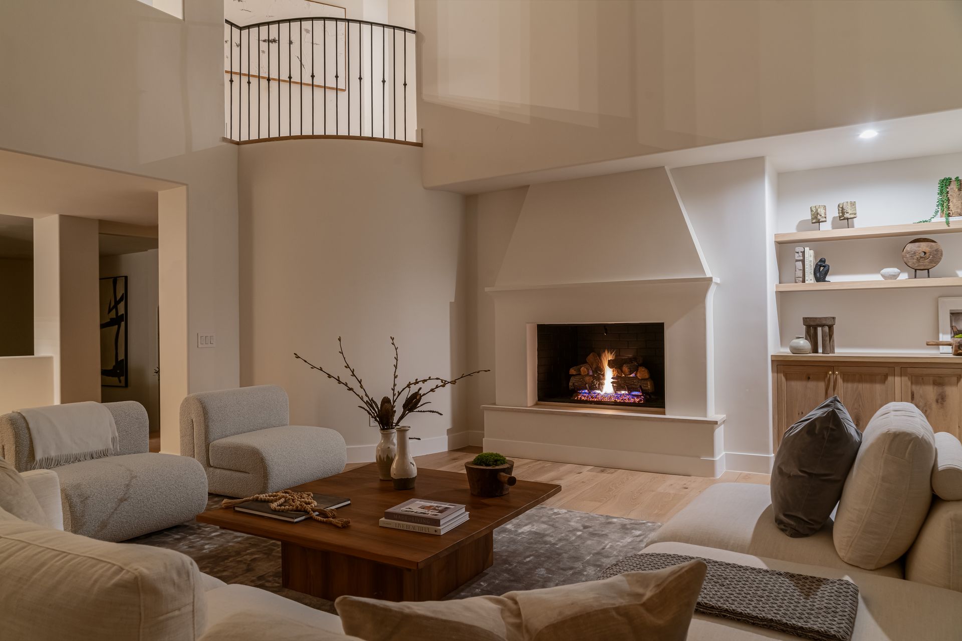 There is a fireplace in the middle of the living room.