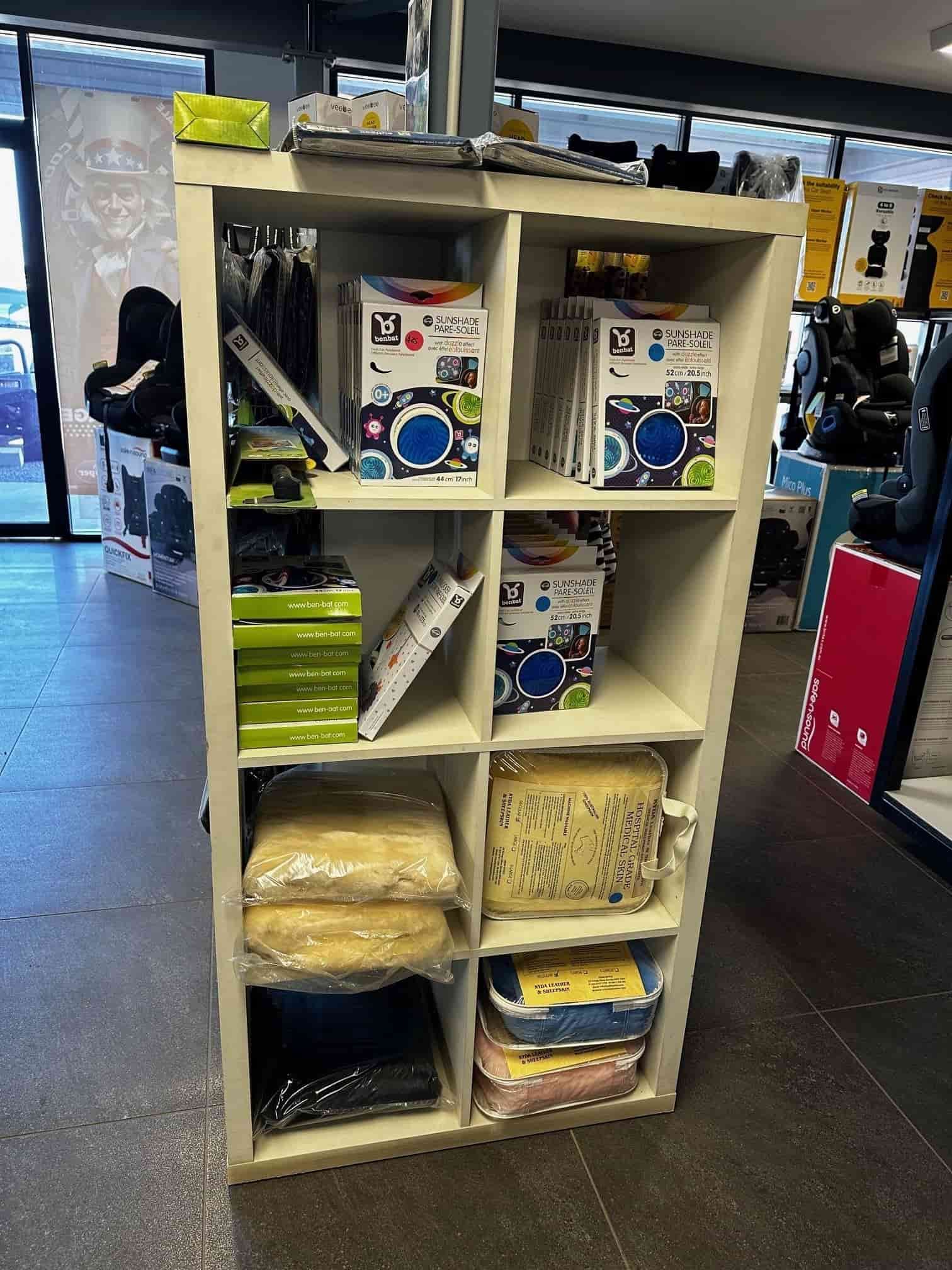 A White Shelf Filled With Lots Of Items In A Store  — Smitty's Tyres & More In Taminda, NSW