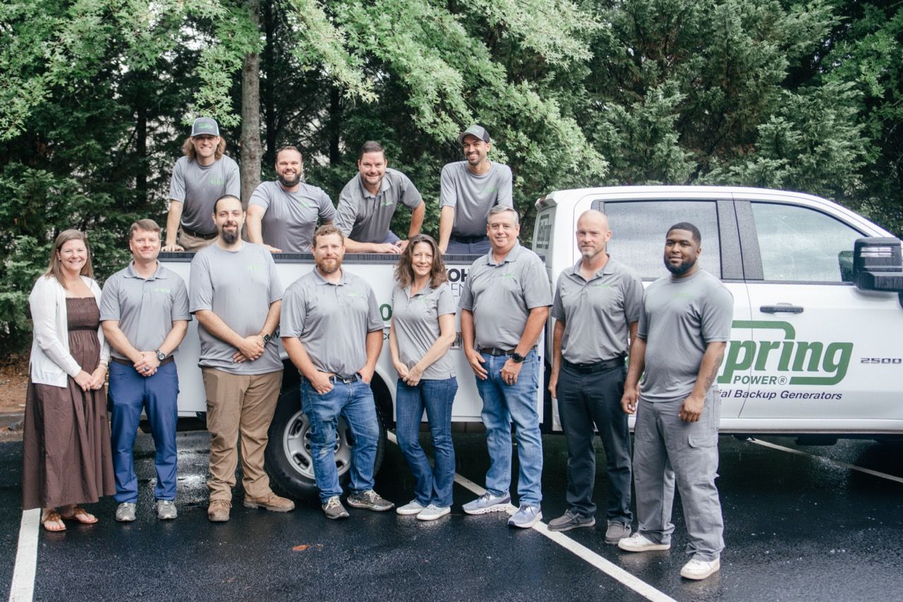 The GenSpring Power, Inc. Team Around a Newly Installed Generator for a Georgia Home.