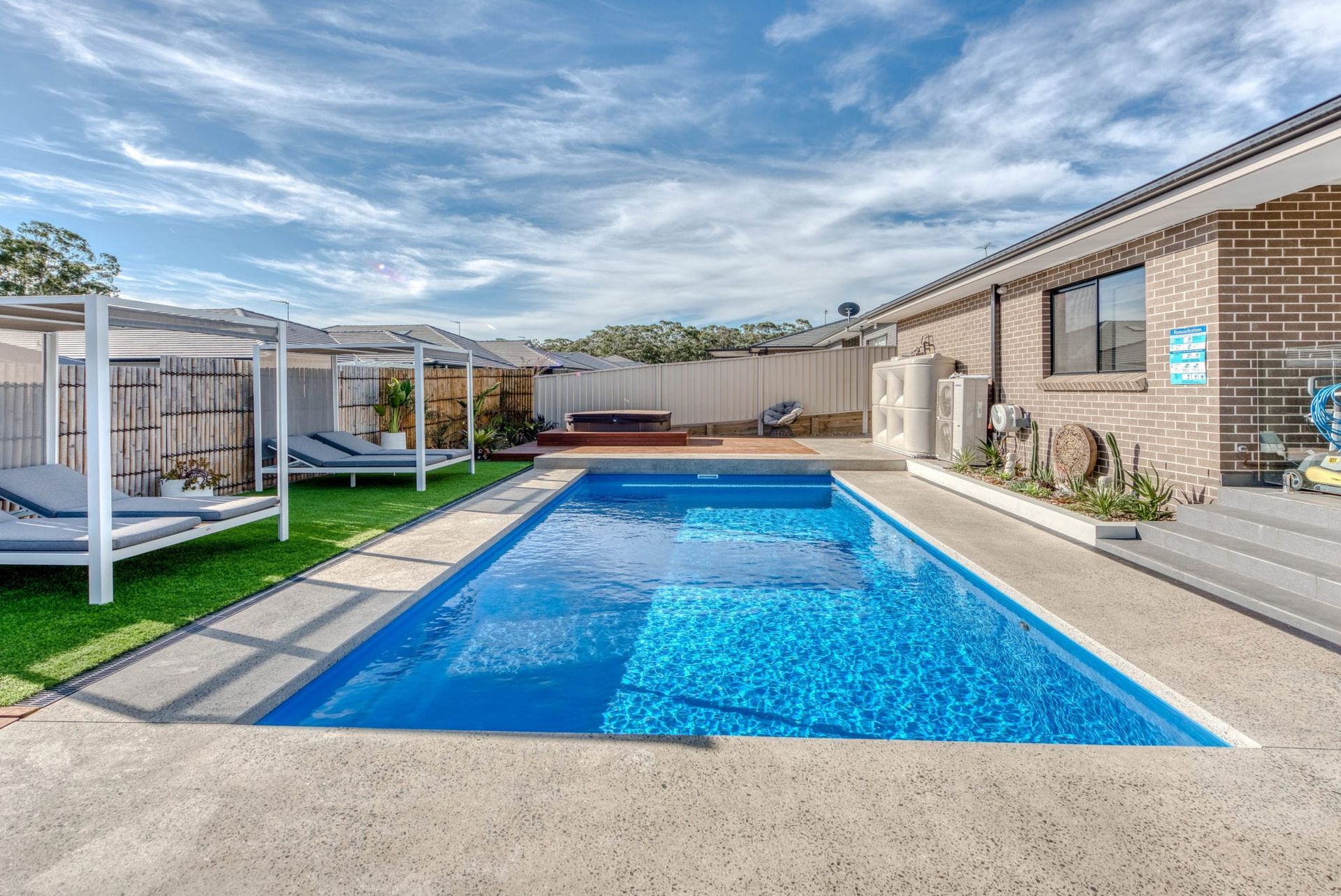 Installed inground fibreglass pool by Coast Life Pools & Spas
