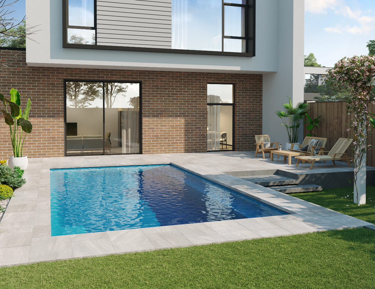 Modern home exterior with a pool, patio furniture, and brick wall.