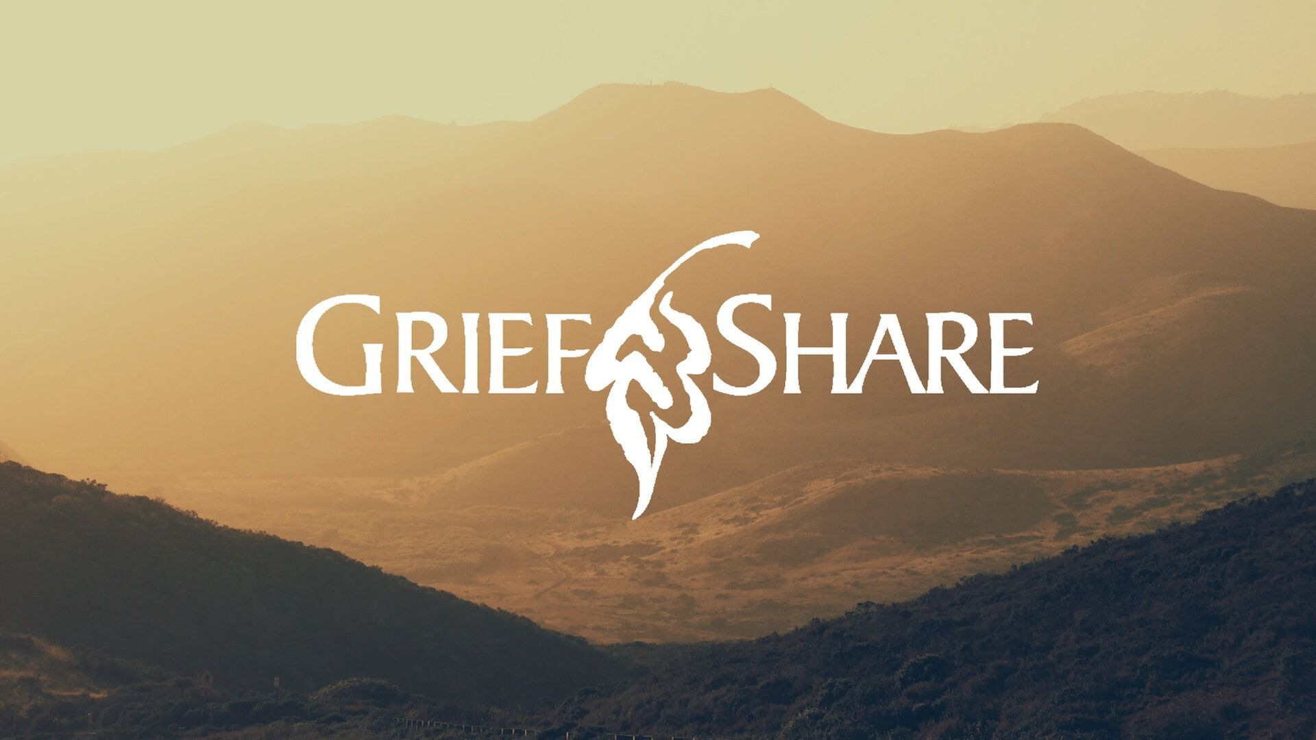 GriefShare logo over a sunrise mountain landscape in warm gold and brown tones