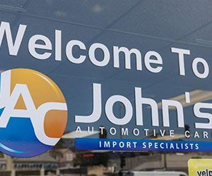 Welcome sign on a glass window, 