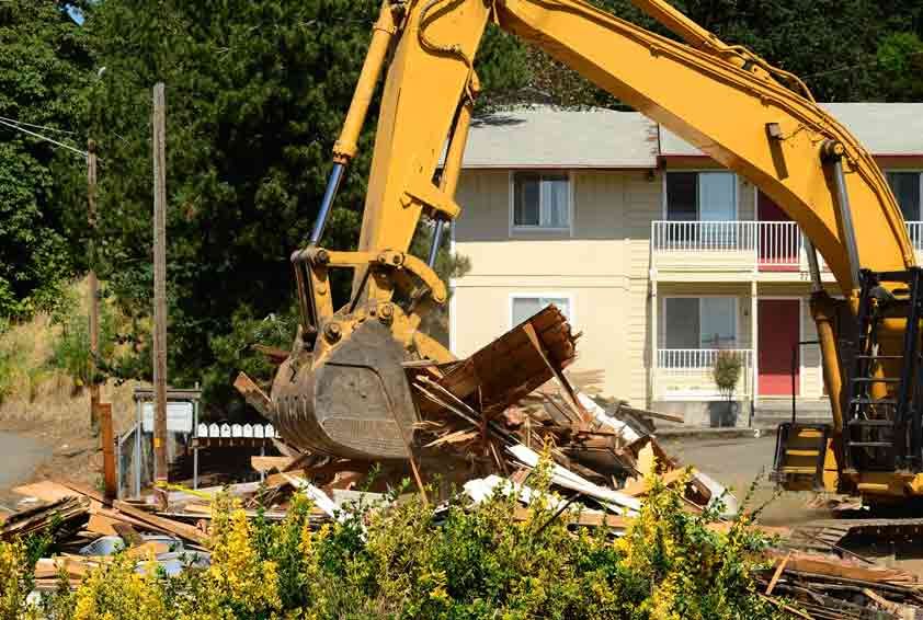 An Excavator On A Residential Demolition site on the Sunshine Coast — Allcoast Group Demolition Contractors from Residential Demolition Group