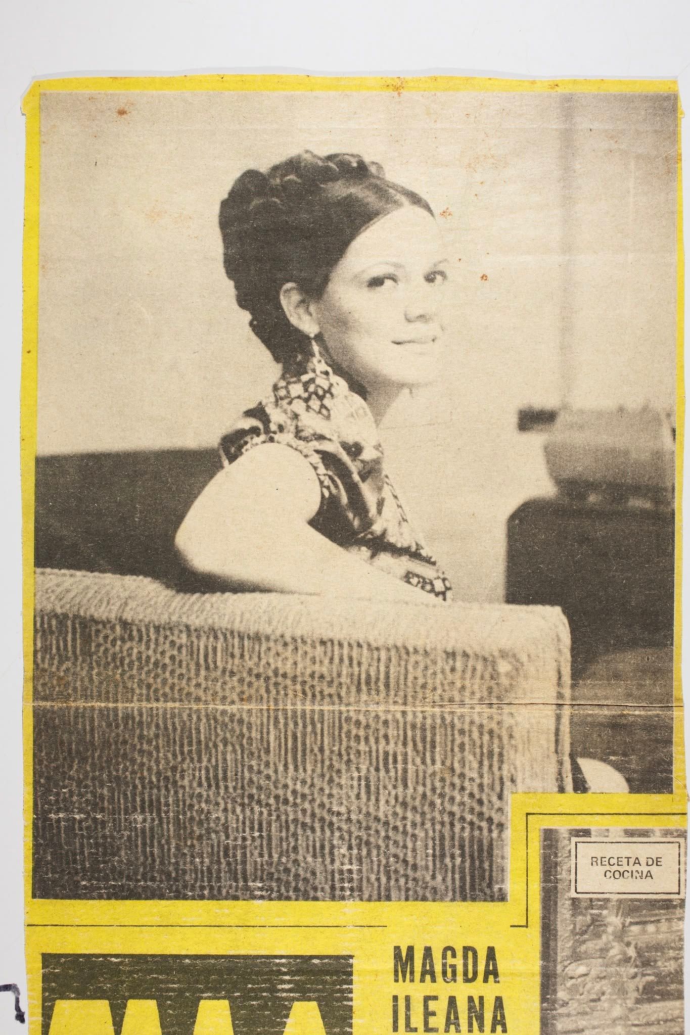 Sepia photo of a seated woman in profile, with a woven chair and a yellow border.