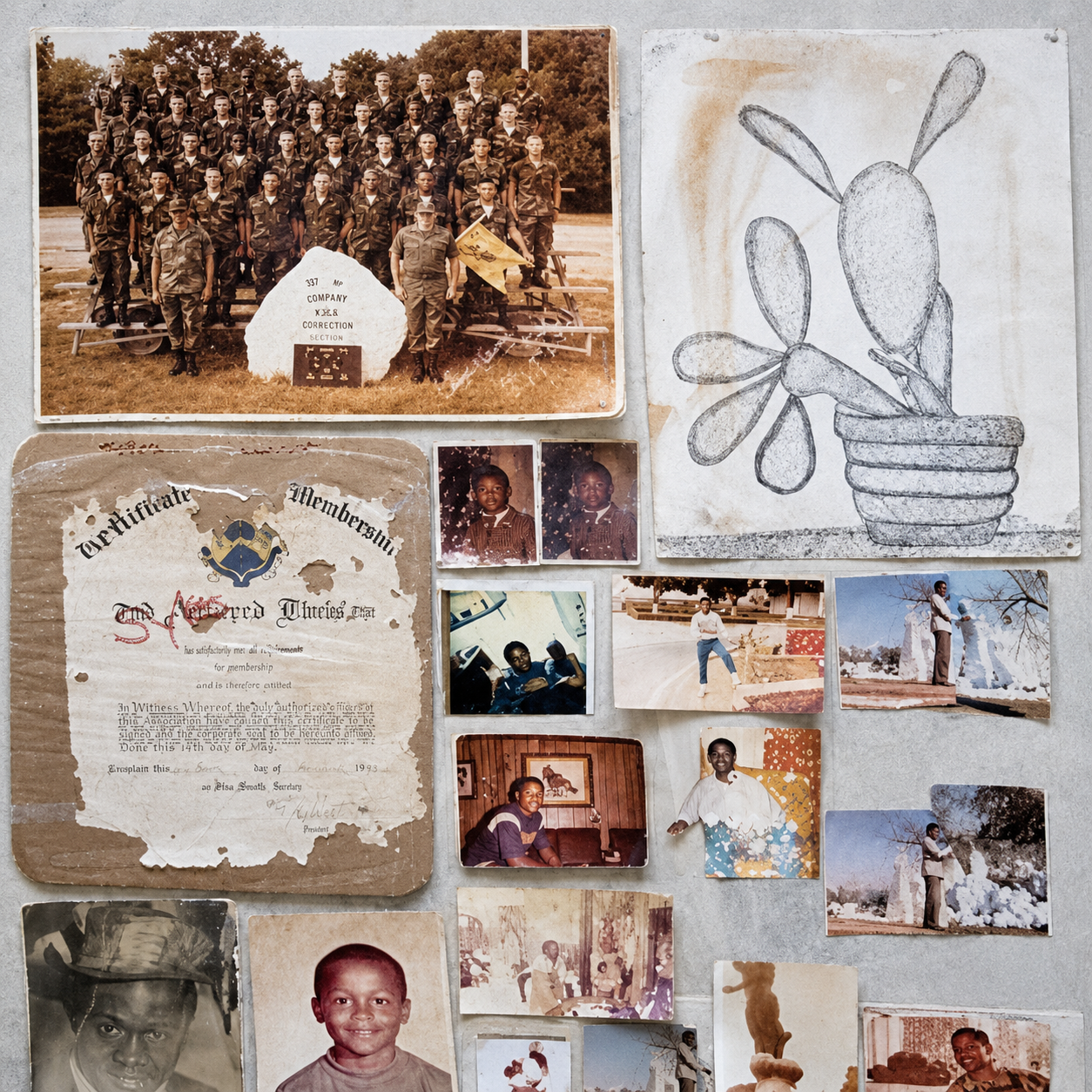 Collage of vintage photos, drawings, and certificates pinned on a beige background.